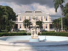 02B Devon House mansion with a statue, fountain and trees from the expansive garden Kingston Jamaica